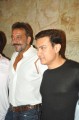 Actors Sanjay Dutt and Aamir Khan during the special screening film PK, in Mumbai