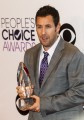Adam Sandler Poses His Awards